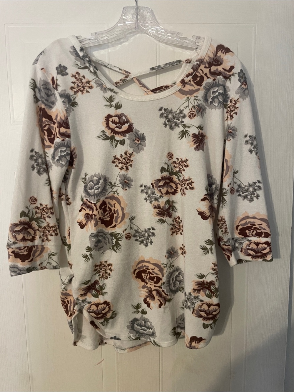 No boundaries cream top with floral accents tunic